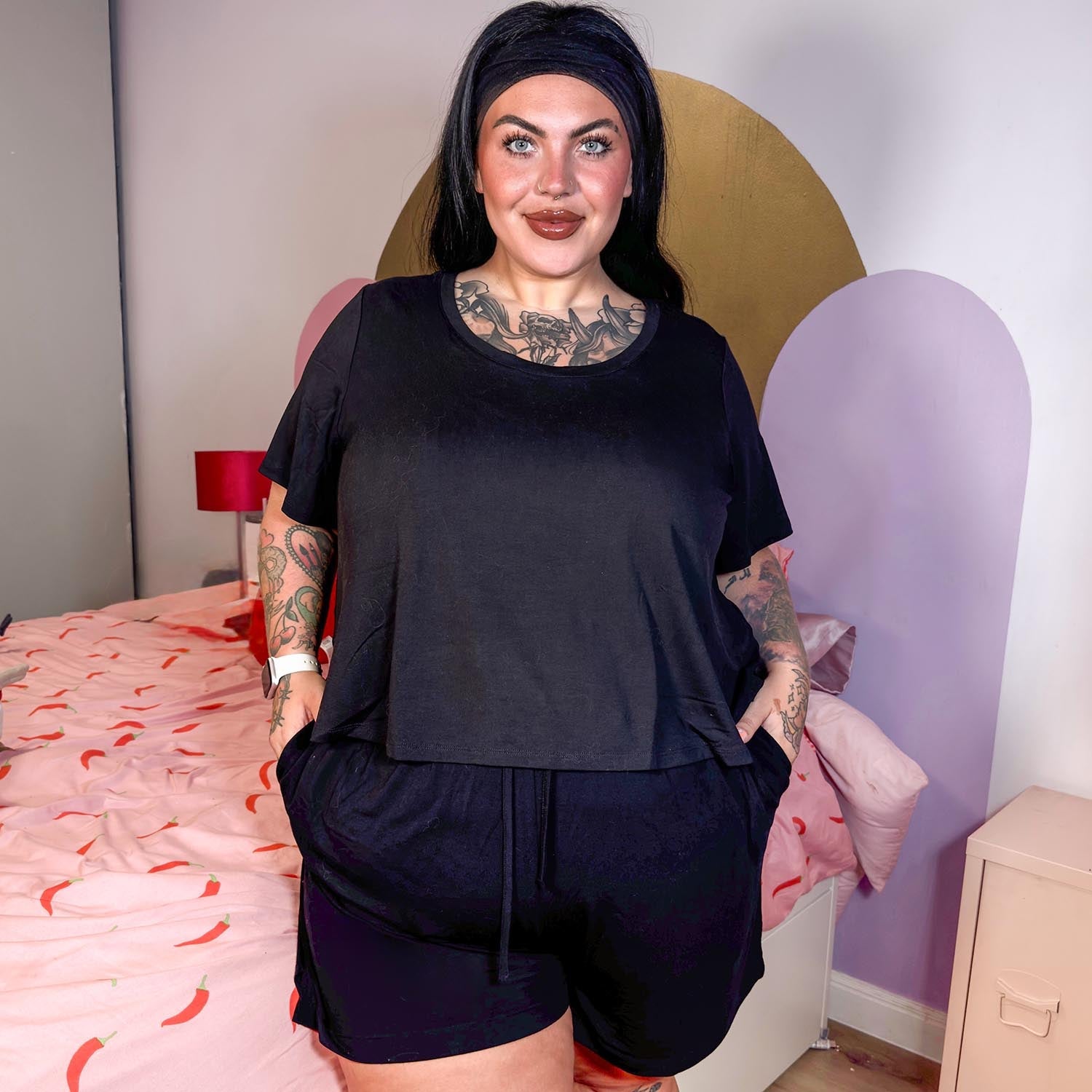 Front view of Black Viscose Scoop Neck Tee with a wide, open neckline and soft, sensory-friendly fabric.