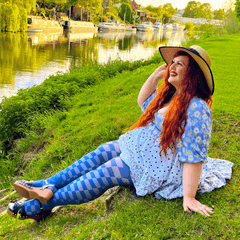 Woman wearing blue checkboard racy tights