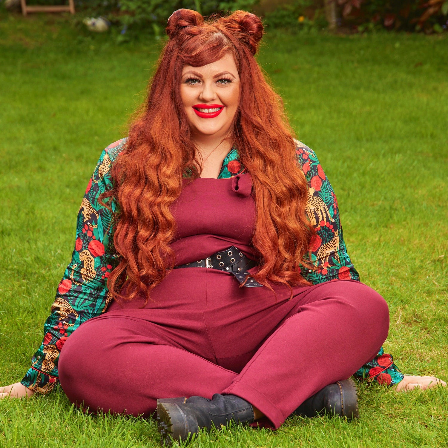 Woman wearing burgundy dungarees